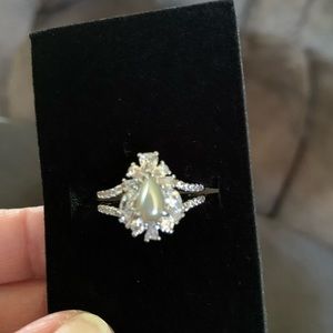 Silver tone teardrop shape faux pearl ring with crystals